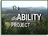 A screen capture of The disAbility Project. The title screen is a Vermont mountain and tree tops.